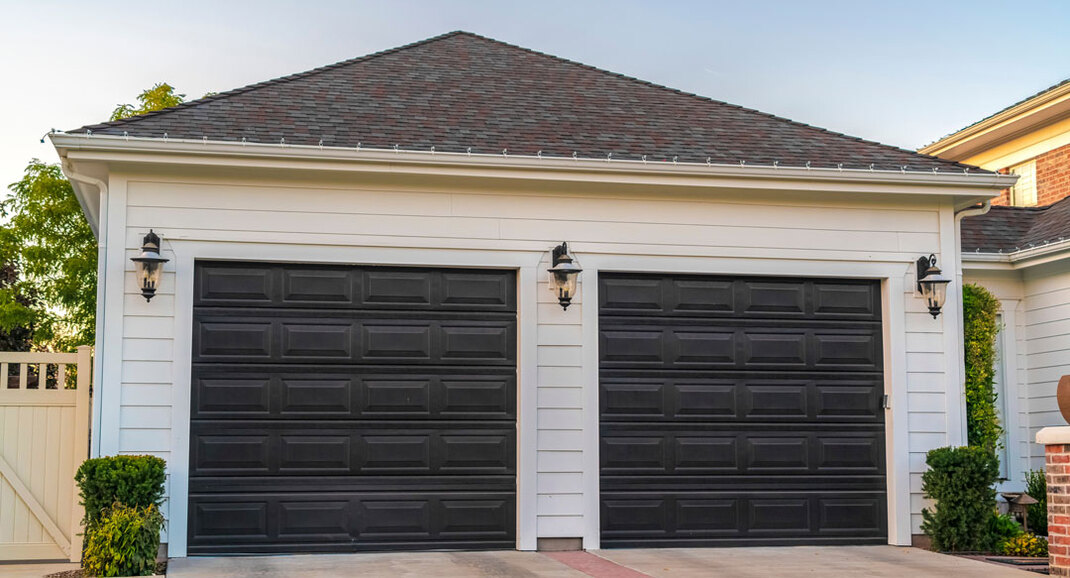 Double garage doors installed by On-Track Overhead Doors