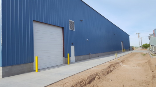 Produce cooler overhead door